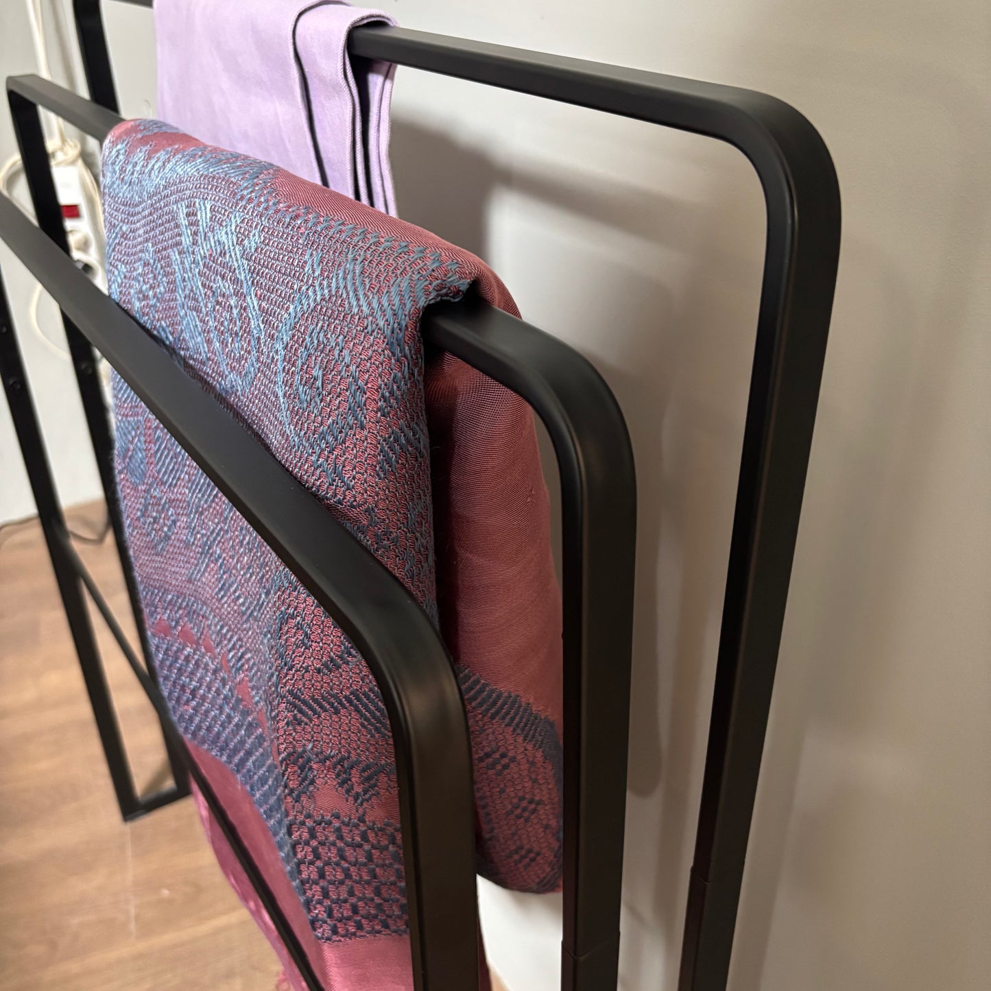 Suporte para cobertores/toalhas