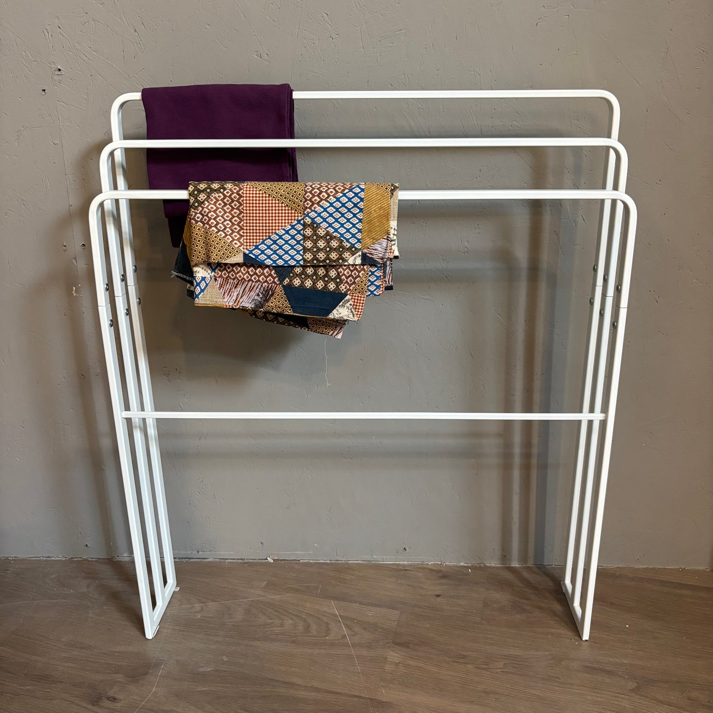 Suporte para cobertores/toalhas