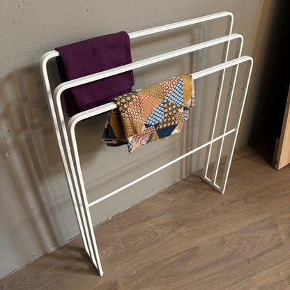 Suporte para cobertores/toalhas