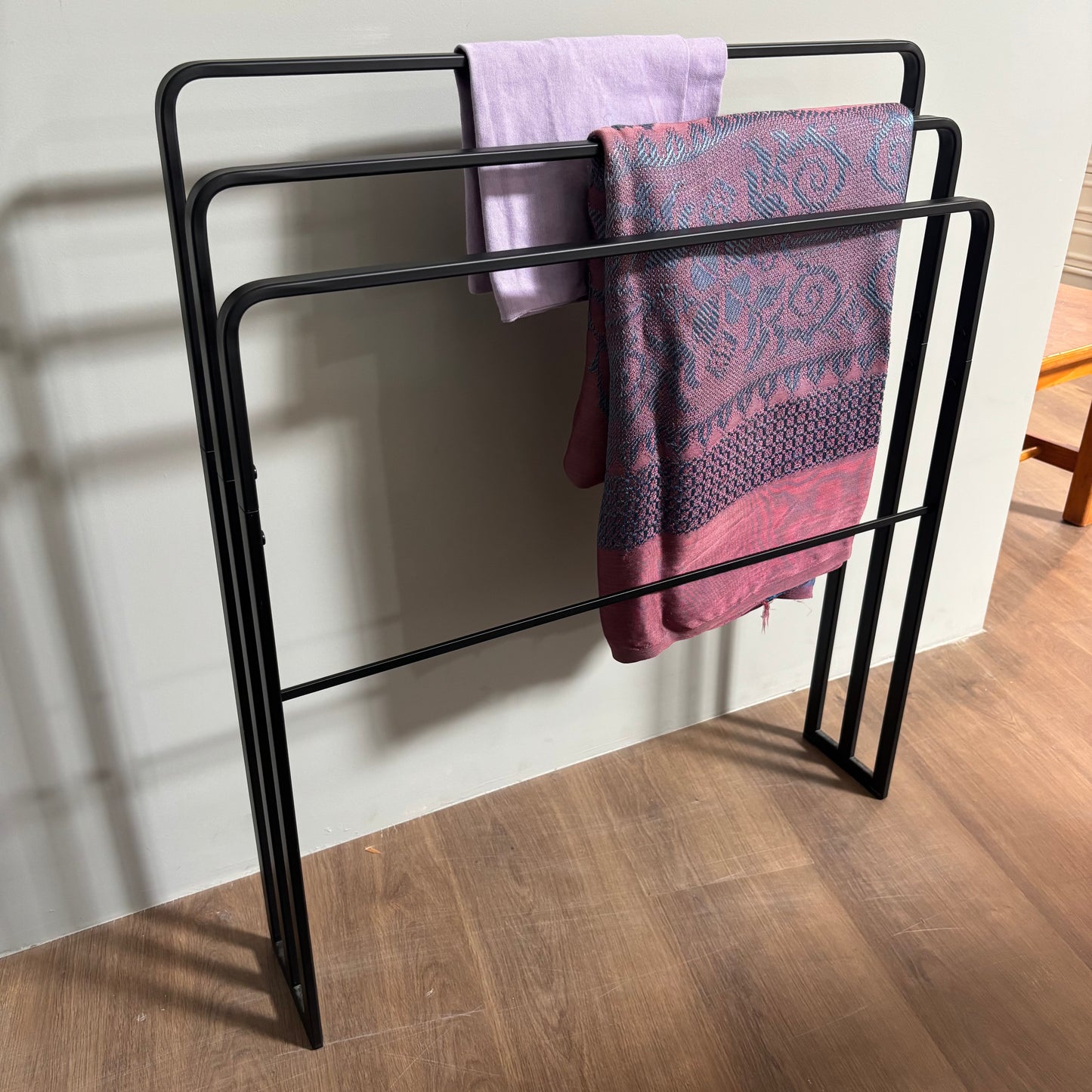 Suporte para cobertores/toalhas